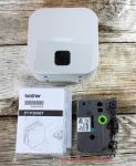 Brother PT-P300BT P-Touch Cube Etikettendrucker - Inhalt der Verpackung - Drucker, Probeband und Bedienungsanleitung