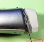 Herausdrücken des Unterteils mit einem Messer