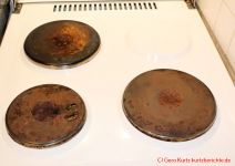 Pflege von alten Gusseisenkochplatten - Herd mit Massekochplatten