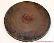 Pflege von alten Gusseisenkochplatten - Rost mit Löchern auf der Kochplatte
